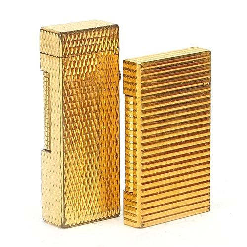 106 - Two boxed Dunhill and Dupont gold plated lighters, the largest 6.5cm in length