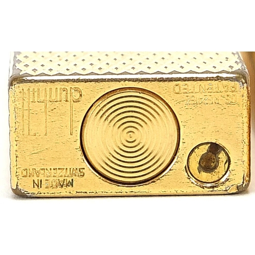 106 - Two boxed Dunhill and Dupont gold plated lighters, the largest 6.5cm in length