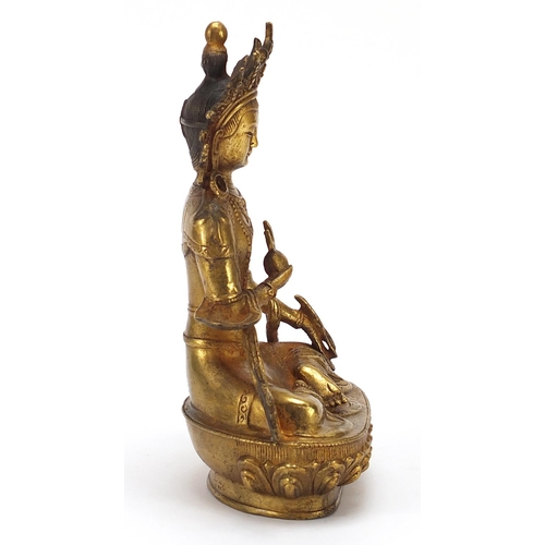 52 - Chino Tibetan gilt bronze figure of seated buddha, 20cm high