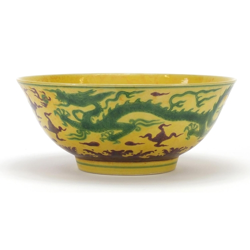 122 - Chinese porcelain dragon bowl, six figure character marks to the base, 19cm in diameter