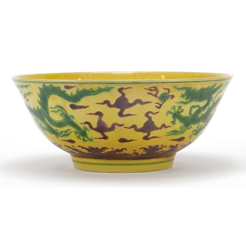 122 - Chinese porcelain dragon bowl, six figure character marks to the base, 19cm in diameter