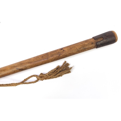 1445 - Military interest short bayonet with sheath fitted to a wooden handle, 69cm in length