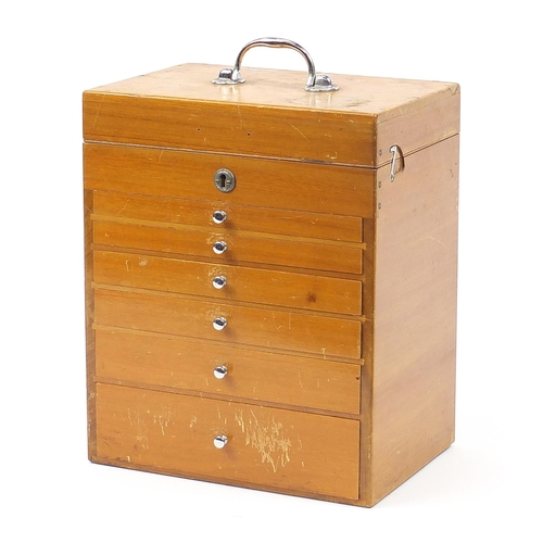 341 - Lightwood six drawer dentist's cabinet with a lift up top, 40cm H x 33cm W x 23cm D