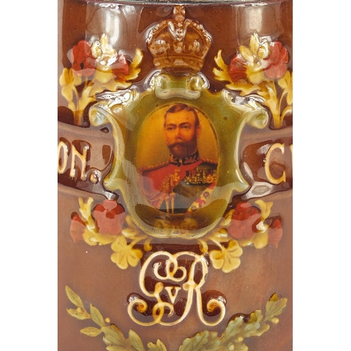 38 - Royal Doulton tankard with a silver collar commemorating George V coronation, 12cm high