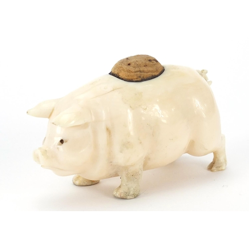 98 - Carved ivory pin cushion in the form of a pig, 6.5cm in length