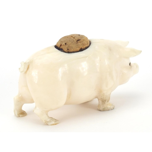 98 - Carved ivory pin cushion in the form of a pig, 6.5cm in length