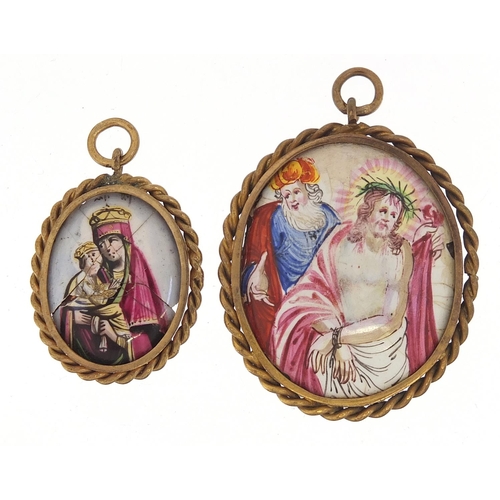 64 - Two antique oval enamel panels housed in pendant mounts including one hand painted with Madonna and ... 
