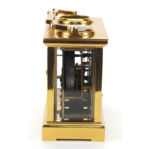 90 - Brass cased travelling timepiece with barometer, clock, thermometer and compass, the barometer and c... 