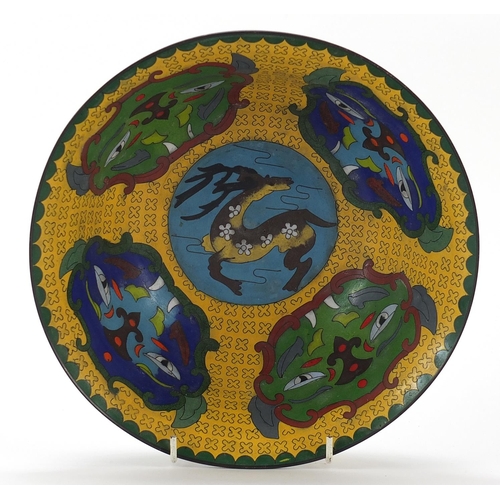 322 - Chinese cloisonne bowl enamelled with mythical faces, 23.5cm in diameter