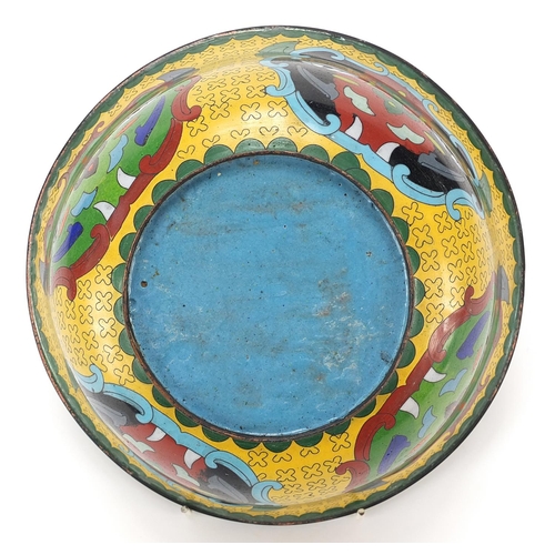 322 - Chinese cloisonne bowl enamelled with mythical faces, 23.5cm in diameter