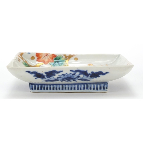 297 - Two Japanese porcelain footed dishes hand painted with flowers, the largest 15cm wide