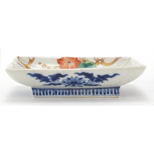 297 - Two Japanese porcelain footed dishes hand painted with flowers, the largest 15cm wide