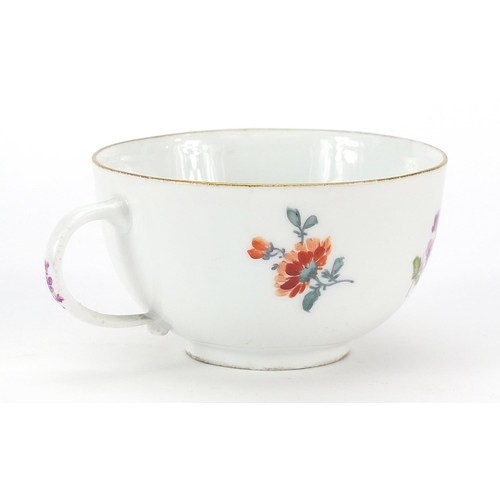 45 - Meissen, 19th century porcelain cup and saucer hand painted with flowers, the saucer 13.5cm in diame... 
