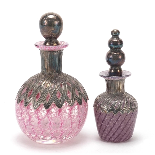 2230 - Two silver overlaid pink and purple glass scent bottles, indistinct hallmarks, the largest 12.5cm hi... 