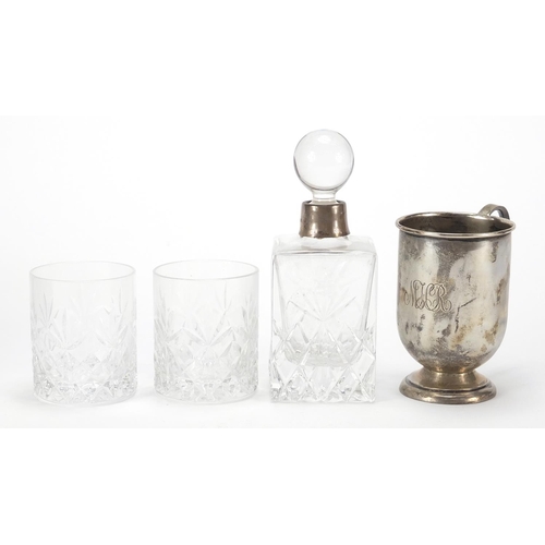 2197 - Francis Howard cut glass bottle and two glasses with silver collar and a silver cup, the cup 8.5cm h... 