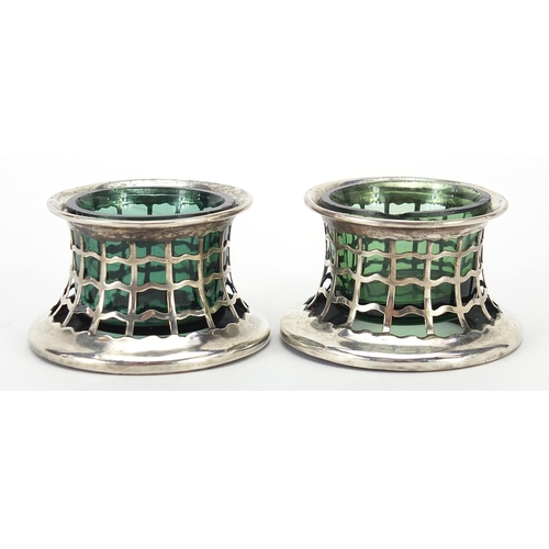 2178 - Pair of Edwardian pierced silver open salts with green glass liners, indistinct maker's mark Birming... 