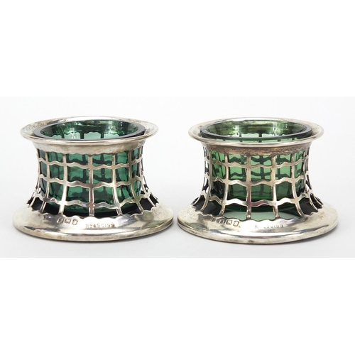 2178 - Pair of Edwardian pierced silver open salts with green glass liners, indistinct maker's mark Birming... 