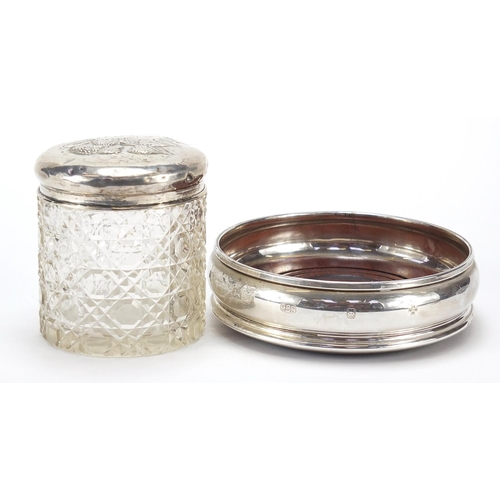 2212 - Circular silver and oak wine coaster and a cut glass jar with silver lid embossed with Putti, variou... 