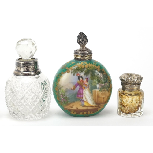 2228 - Victorian and later silver mounted cut glass scent bottles and two porcelain examples, various hallm... 