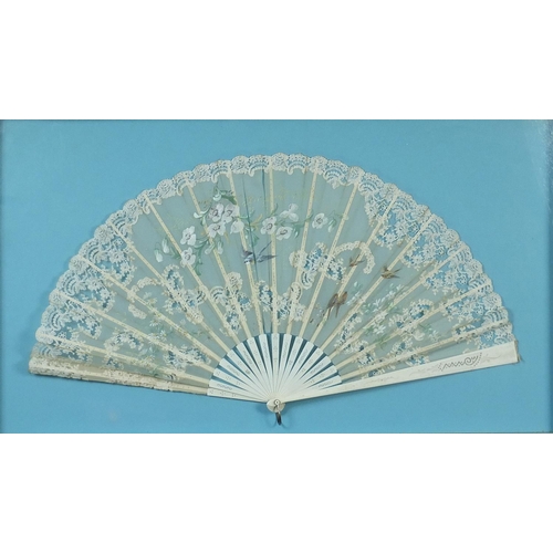 351 - Two Victorian silk fans including an example hand painted with flowers having  bone sticks, each hou... 