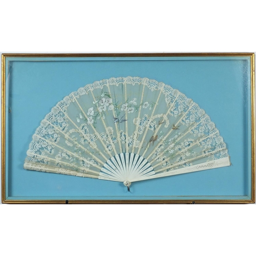 351 - Two Victorian silk fans including an example hand painted with flowers having  bone sticks, each hou... 