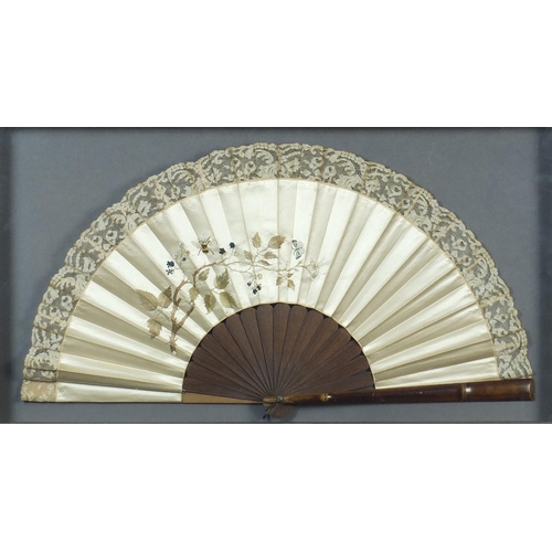 351 - Two Victorian silk fans including an example hand painted with flowers having  bone sticks, each hou... 