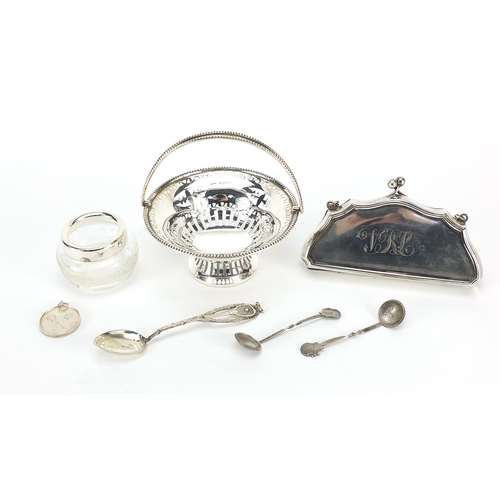 2207 - Silver objects including a concertina purse, pierced bonbon dish with swing handle and tennis medal,... 