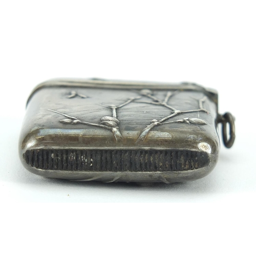 2183 - German silver vesta embossed with a spider and insects in a web, 4.5cm high, 15.0g