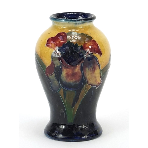 137 - Moorcroft pottery baluster vase hand painted with flowers, 10.5cm high