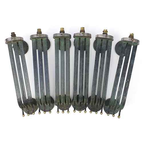 148 - Set of six Art Deco steel wall sconces, each 56cm high