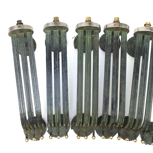 148 - Set of six Art Deco steel wall sconces, each 56cm high