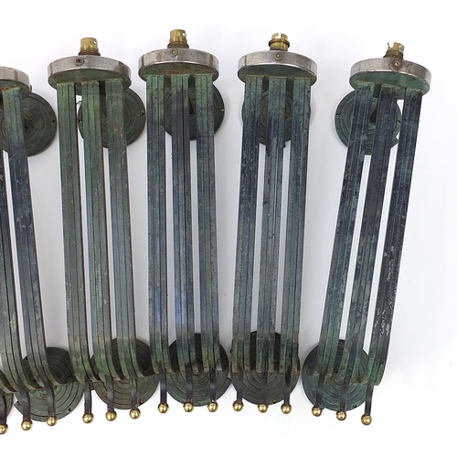 148 - Set of six Art Deco steel wall sconces, each 56cm high