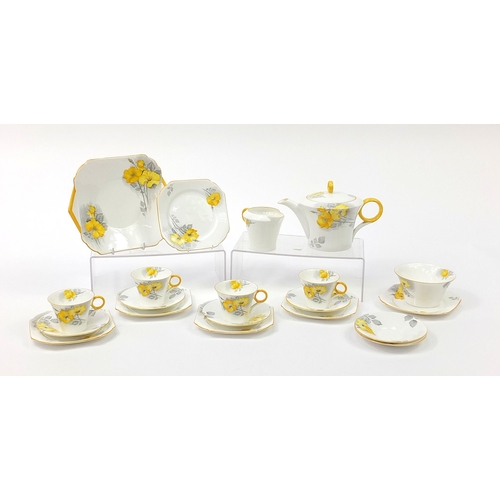 138 - Shelley teaware hand painted with flowers including a teapot, the largest 25cm in length
