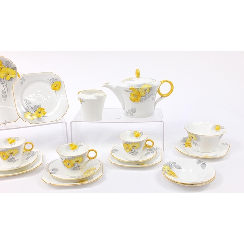 138 - Shelley teaware hand painted with flowers including a teapot, the largest 25cm in length