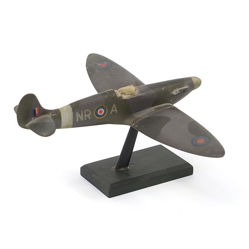 1436 - Military interest hand painted wooden model of a Spitfire, inscribed made by Flight Lieutenant Ralph... 