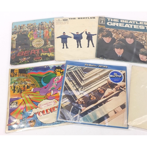 547 - The Beatles vinyl LP's including The White Album with three photographs, Sgt Pepper's Lonely Hearts ... 