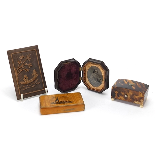 99 - Objects including a tortoiseshell casket with ivory bun feet and a pressed photograph frame housing ... 