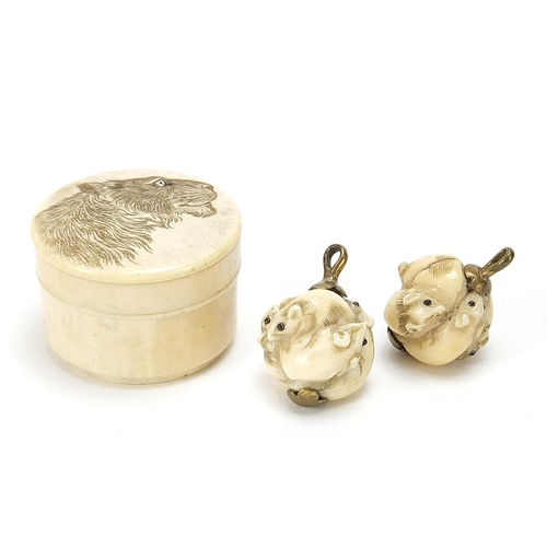 305 - Japanese ivory circular box and cover and a pair of carved mice group buttons, the box 3.5cm in diam... 