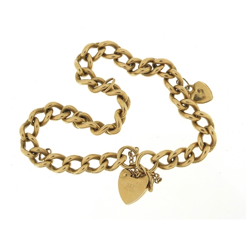 1611 - 9ct gold charm bracelet with love heart padlock, 20cm in length, 26.0g