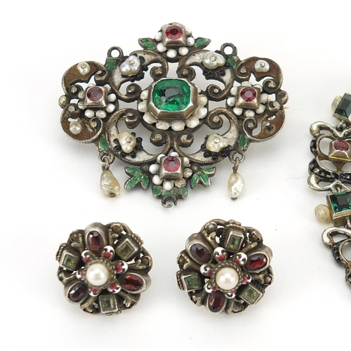 1586 - Austro-Hungarian silver and enamel jewellery suite set with green and red stones, comprising brooch,... 