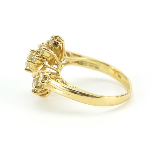 1612 - 18ct gold diamond cluster ring, the central diamond approximately 3mm in diameter, size M, 5.6g