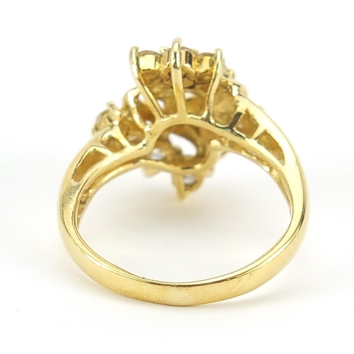 1612 - 18ct gold diamond cluster ring, the central diamond approximately 3mm in diameter, size M, 5.6g