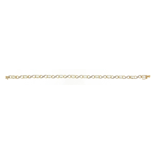 1641 - 9ct gold aquamarine and diamond bracelet, 18cm in length, 5.8g