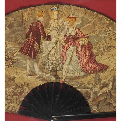 349 - Victorian ebonised tapestry fan depicting three figures in Georgian dress housed in a glazed display... 