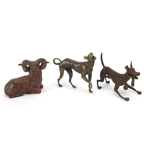 307 - Two Japanese patinated bronze animals comprising goat and dog, together with one other dog, the two ... 