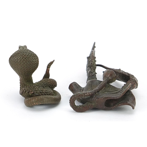 308 - Two Japanese patinated bronze animals comprising cobra and crab, the largest 10.5cm in length