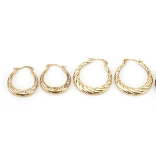 1642 - Three pairs of 9ct gold hoop earrings, the largest 2cm in diameter, total 3.2g