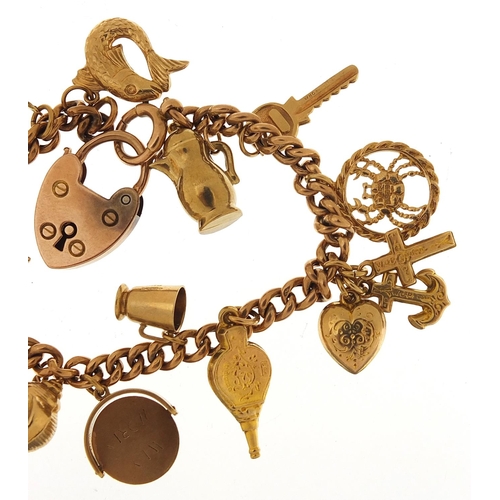 1585 - 9ct gold charm bracelet with a selection of mostly 9ct gold charms including faith, hope and charity... 