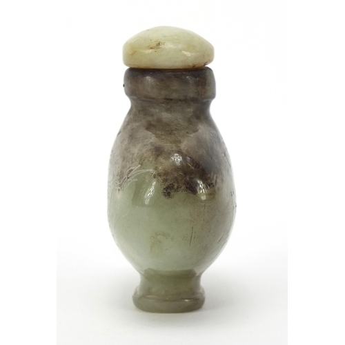 304 - Chinese jade snuff bottle carved with a dragon and calligraphy, 6cm high