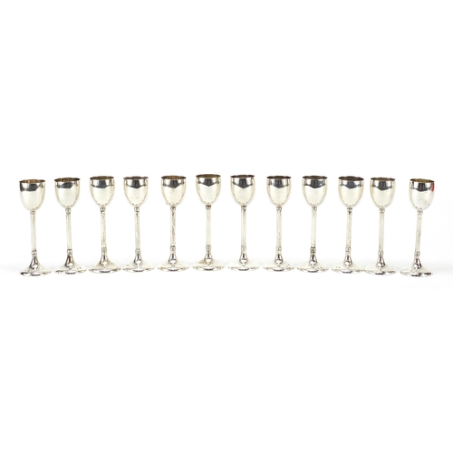 2219 - Set of twelve Austro Hungarian early 20th century  silver liqueur glasses, 12cm hhigh, total 645.0g